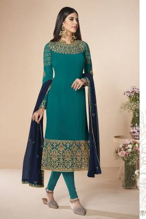 Here Is A Rich And Elegant Looking Designer Straight Suit In Blue Color Paired With Navy Blue Colored Dupatta. Its Embroidered Top And Dupatta Are Fabricated On Georgette Paired With Santoon Fabricated Bottom. Buy This Semi-Stitched Suit No