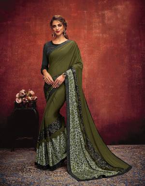 the beauty of this saree lies in the ability to look contemporary and glamorous. Ope for a free-falling style to enhance the striking cuts and patterns. 