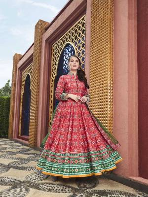 Give An Enhanced Traditional Look To Your Personlity Wearing This Designer Readymade Floor Length Suit In Red Color Paired With Contrasting Green Colored Dupatta. Its Digital Printed Top Is Silk Based Paired With Cotton Crepe Fabricated Bottom And Net Fabricated Dupatta Which Is Beautified With Sequence Work. 