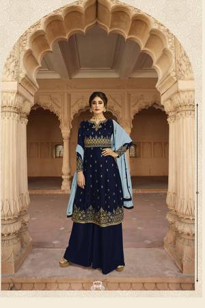 Enhance Your Personality Wearing This Designer Kali Patterned Suit In Navy Blue Color Paired with Navy Blue Colored Plazzo And Light Blue Colored Dupatta. It Pretty Embroidered Top Is Fabricated On Georgette Paired With Santoon Bottom And Georgette Fabricated Dupatta. Buy This Semi-Stitched Suit Now.