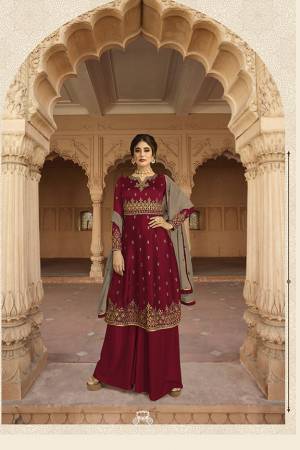 Enhance Your Personality Wearing This Designer Kali Patterned Suit In Maroon Color Paired with Maroon Colored Plazzo And Sand Grey Colored Dupatta. It Pretty Embroidered Top Is Fabricated On Georgette Paired With Santoon Bottom And Georgette Fabricated Dupatta. Buy This Semi-Stitched Suit Now.