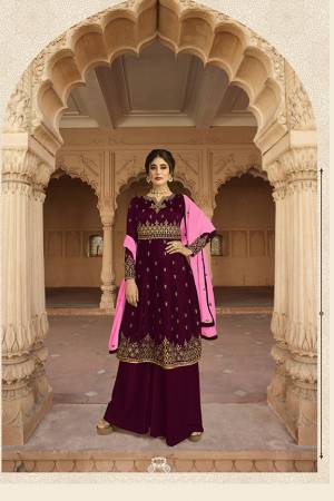 Enhance Your Personality Wearing This Designer Kali Patterned Suit In Wine Color Paired with Wine Colored Plazzo And Pink Colored Dupatta. It Pretty Embroidered Top Is Fabricated On Georgette Paired With Santoon Bottom And Georgette Fabricated Dupatta. Buy This Semi-Stitched Suit Now.