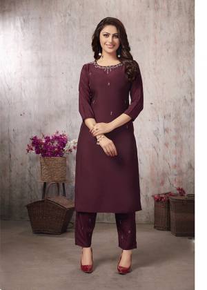 For Your Festive Wear, Grab This Designer Readymade Pair Of Kurti And Pants In Wine Color. This Pretty Pair Is Muslin Fabricated Beautified With Minimal Elegant Hand Work. Its Rich Color And Fabric Will Definitely Earn You Lots Of Complimets From Onlookers. 