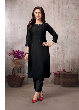 Add This Very Beautiful Designer Readymade Kurti With Pants In Black Color. This Readymade Pair Is Fabricated On Muslin Beautified With Elegant Hand Work. It Is Available In All Sizes And Also Its Fabric Ensures Superb Comfort All Day Long. 