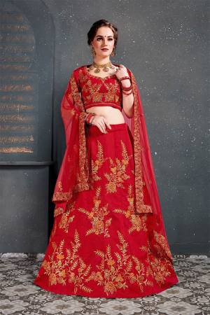 Catch All The Limelight At The Next Wedding You Attend Wearing This Heavy Designer Lehenga Choli In All Over Red Color. This Lehnega Choli Is Slub Silk Based Paired With Net Fabricated Dupatta.