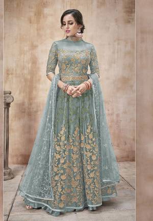 Add This New Shade In Blue To Your Wardrobe With This Designer Floor Length Suit In Baby Blue Color. Its Heavy Embroidered Top And Dupatta Are Net Based Paired With Satin Silk Bottom. Buy Now.