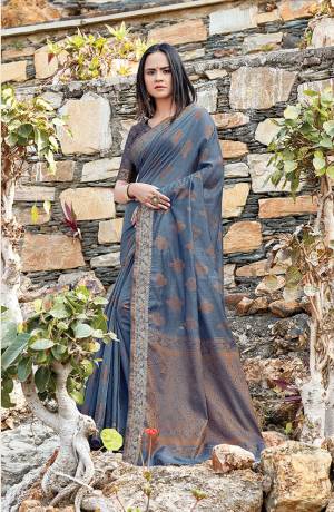 Grab This Very Beautiful Pretty Elegant Saree In Grey Color Paired?With Grey Colored Blouse. This Saree And Blouse Are Fabricated On Handloom Cotton Beautified With Pretty Weave.
