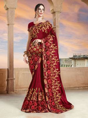 For A Royal Look, Grab This Heavy Designer Saree In Maroon Color Paired With Maroon Colored Blouse. This Saree And Blouse Are Silk Based Beautified With Heavy Embroidery. This Lovely Saree Is Suitable For Wedding And Party Wear. 