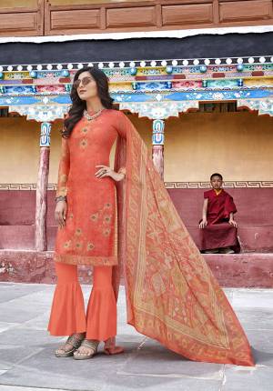 Celebrate This Festive Season With Beauty And Comfort In This Very Pretty Suit In Orange Color. Its Pretty Embroidered And Printed Top Is Silk Based Paired With Cotton Satin Bottom And Chiffon Fabricated Dupatta. Buy Now.