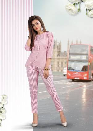 Grab This Lovely Co-Ordinated Set In Pink Color Consisting Of A Top And Bottom. This Readymade Pair Is Cotton Based Beautified Lining Prints. Buy Now.