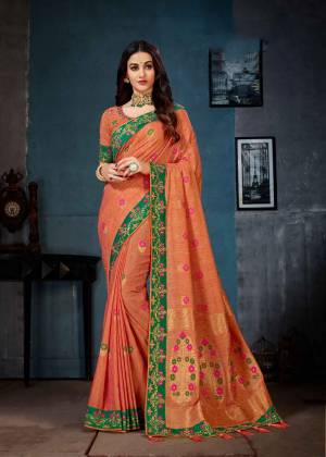 Add This Beautiful Designer Saree To Your Wardrobe In Rust Orange Color. This Saree And Blouse Are Fabricated On Linen Cotton Silk Beautified With Weaving And Attractive Embroidery. 