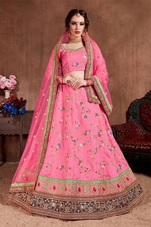 Pretty Elegant Looking Designer Lehenga Choli Is Here In All Over Pink Color. Its Blouse And lehenga Are Fabricated On Art Silk Paired With Net Fabricated Dupatta. It Is Beautified With Subtle Embroidery. Buy Now.