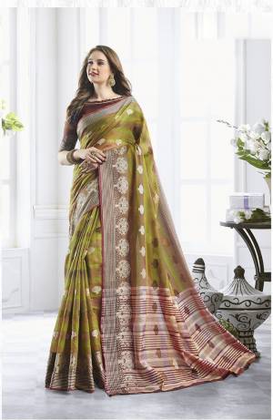 Classy Saree look pretty like never before.Wearing this Olive Green Color Saree which made from Cotton Handloom With Brown Color Cotton Handloom blouse, Saree has also decorative work like Woven Work With Zari.This beautiful Saree features a classy Zari Work Work all over,which makes it a smart pick for all occasions. You can wear this Saree in different styles. Buy Now.