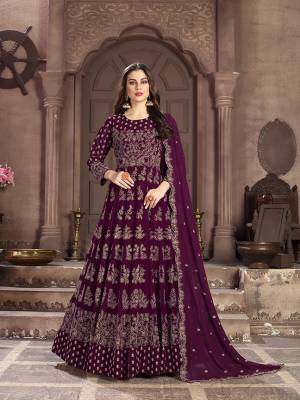 Add This Lovely Designer Floor Length Suit to Your Wardrobe In Purple Color. Its Beautiful Attractive Embroidered Top and Dupatta are Fabricated On Georgette Paired With Santoon Bottom. This Suir Is Light In Weight And Easy To Carry Throughout The Gala.