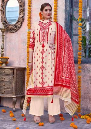 Flaunt Your Rich and Elegant Taste Wearing This Designer Suit In Cream And Red Color. Its Top Is Fabricated On Linen Paired With Cotton Fabricated Bottom And Chanderi Fabricated Dupatta. This Pretty Suit Is Suitable For Your Semi-Casuals Or Festive Wear. 