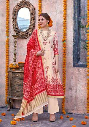 Flaunt Your Rich and Elegant Taste Wearing This Designer Suit In Cream And Red Color. Its Top Is Fabricated On Linen Paired With Cotton Fabricated Bottom And Chanderi Fabricated Dupatta. This Pretty Suit Is Suitable For Your Semi-Casuals Or Festive Wear. 