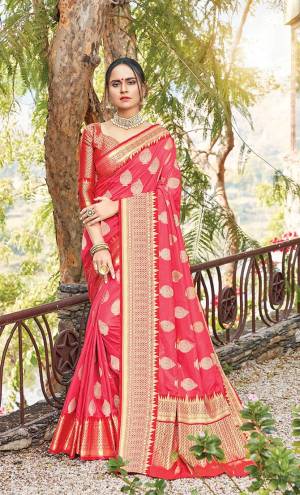 Classy Saree look pretty like never before.Wearing this Dark Pink Color Saree which made from Dola Art Silk With Red Color Dola Silk blouse, Saree has also decorative work like Heavy Zari Work.This beautiful Saree features a classy Zari Work Work all over,which makes it a smart pick for all occasions. You can wear this Saree in different styles Pairing It Will Different Accessories. 