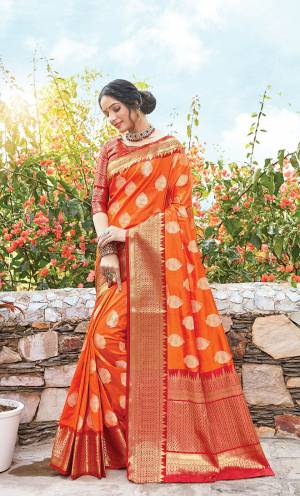 Classy Saree look pretty like never before.Wearing this Orange Color Saree which made from Dola Art Silk With Red Color Dola Silk blouse, Saree has also decorative work like Heavy Zari Work.This beautiful Saree features a classy Zari Work Work all over,which makes it a smart pick for all occasions. You can wear this Saree in different styles Pairing It Will Different Accessories. 