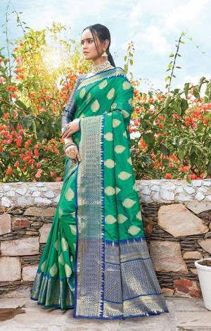 Classy Saree look pretty like never before.Wearing this Sea Green Color Saree which made from Dola Art Silk With Royal Blue Color Dola Silk blouse, Saree has also decorative work like Heavy Zari Work.This beautiful Saree features a classy Zari Work Work all over,which makes it a smart pick for all occasions. You can wear this Saree in different styles Pairing It Will Different Accessories. 