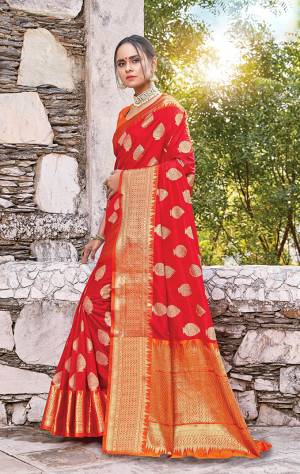 Classy Saree look pretty like never before.Wearing this Red Color Saree which made from Dola Art Silk With Orange Color Dola Silk blouse, Saree has also decorative work like Heavy Zari Work.This beautiful Saree features a classy Zari Work Work all over,which makes it a smart pick for all occasions. You can wear this Saree in different styles Pairing It Will Different Accessories. 