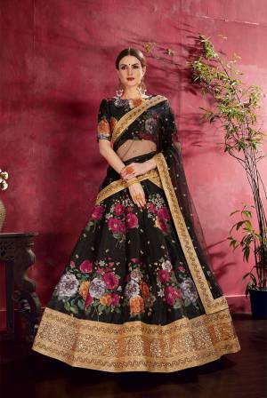 Adorn A Lovely Trendy Look This Wedding Season With This Heavy Designer Lehenga Choli In Black Color. This Beautiful Lehenga Choli Is Art Silk Beautified With Attractive Digital Print And Embroidery Paired With Net Fabricated Embroidered Dupatta. Buy This Lovely Lehenga Choli Now.