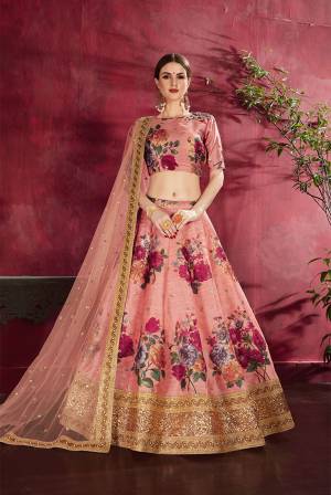Adorn A Lovely Trendy Look This Wedding Season With This Heavy Designer Lehenga Choli In Dusty Pink Color. This Beautiful Lehenga Choli Is Art Silk Beautified With Attractive Digital Print And Embroidery Paired With Net Fabricated Embroidered Dupatta. Buy This Lovely Lehenga Choli Now.