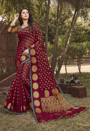 Here Is A Rich Looking Designer Silk Based Saree In Maroon Color. This Saree Is Fabricated On Handloom Silk Paired With Jacquard Silk Fabricated Blouse. Buy Now.