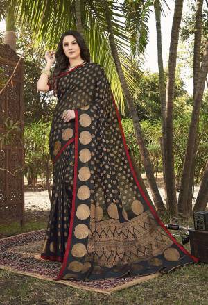 Here Is A Rich Looking Designer Silk Based Saree In Black Color. This Saree Is Fabricated On Handloom Silk Paired With Jacquard Silk Fabricated Blouse. Buy Now.