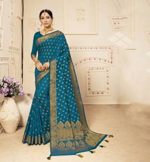 For A Proper Traditional Look, Grab This Designer Saree In Blue Color. This Heavy Weaved Saree Is Banarasi Art Silk Based Paired With Art Silk Fabricated Blouse. Buy This Saree Now. It IS Light Weight, Durable And Easy To Carry All Day Long. 