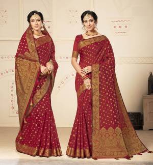 Flaunt Your Rich And Elegant Taste Wearing This Lovely Silk Based Saree In Dark Pink Color. This Saree Is Fabricated On Banarasi Art Silk Paired With Art Silk Fabricated Blouse, It Is Beautified With Pretty Weave. Buy Now