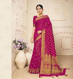 For A Proper Traditional Look, Grab This Designer Saree In Magenta Pink Color. This Heavy Weaved Saree Is Banarasi Art Silk Based Paired With Art Silk Fabricated Blouse. Buy This Saree Now. It IS Light Weight, Durable And Easy To Carry All Day Long. 