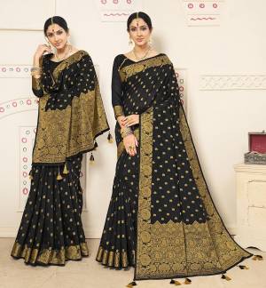 For A Proper Traditional Look, Grab This Designer Saree In Black Color. This Heavy Weaved Saree Is Banarasi Art Silk Based Paired With Art Silk Fabricated Blouse. Buy This Saree Now. It IS Light Weight, Durable And Easy To Carry All Day Long. 