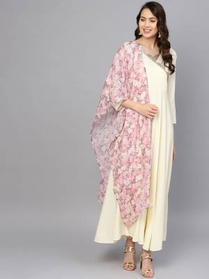Grab This Beautiful Pair Of Readymade Gown In Off-White Color Paired With Pink Colored Digital Printed Dupatta. This Pretty Gown Is Crepe Based Paired With Georgette Fabricated Dupatta. It Is Available In All Regular Sizes And its Fabric Ensures Superb Comfort all Day Long. 