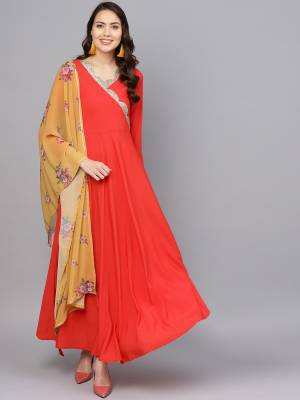 Grab This Beautiful Pair Of Readymade Gown In Red Color Paired With Musturd Yellow Colored Digital Printed Dupatta. This Pretty Gown Is Crepe Based Paired With Georgette Fabricated Dupatta. It Is Available In All Regular Sizes And its Fabric Ensures Superb Comfort all Day Long. 