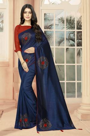 Add Some Semi-Casuals With This Pretty Designer Saree In Royal Blue Color Paired With Red Colored Blouse. This Saree And Blouse are Fabricated On Art Silk Beautified With Stone Work And 3D Flowers. This Saree Is Light Weight And Easy To Carry All Day Long .