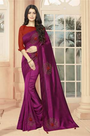 Celebrate This Festive Season With Beauty And Comfort Wearing This Lovely And Elegant Looking Deisgner Saree In Magenta Pink Color Paired With Red Colored Blouse. This Saree And Blouse are Silk Based Beautified With 3D Flowers And Stone Work. 