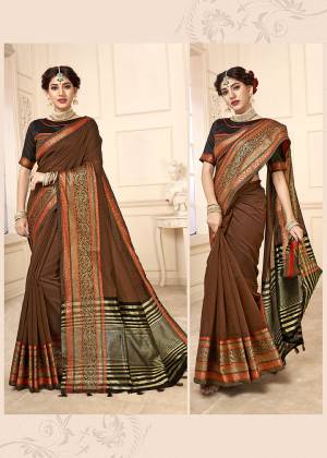 Here Is Proper Traditional Looking Designer Weaved Saree In Brown Color Paired With Dark Brown Colored Blouse. This Saree Is Fabricated on Cotton Silk Paired With Art Silk Fabricated Blouse. It Is Light Weight And Easy To Carry All Day Long. 