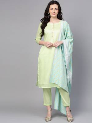 Look Pretty Wearing This Readymade Suit In Pastel Green Color Paired With Contrasting Baby Blue Colored Dupatta. This Pretty Suit Is Fabricated on Poly Silk Paired With Crepe Fabricated Dupatta, Its Fabrics Are Soft Towards Skin And Gives A Rich look To Your Personality. 