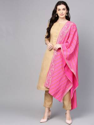 Look Pretty Wearing This Readymade Suit In Beige Color Paired With Contrasting Dark Pink Colored Dupatta. This Pretty Suit Is Fabricated on Poly Silk Paired With Crepe Fabricated Dupatta, Its Fabrics Are Soft Towards Skin And Gives A Rich look To Your Personality. 