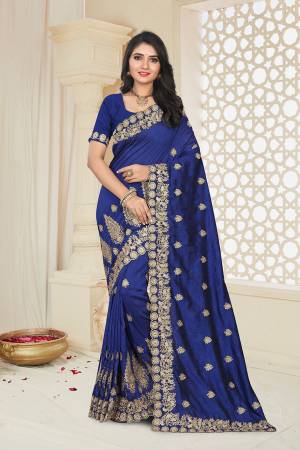 Grab This Designer Saree For The Upcoming Festive And Wedding Season In Royal Blue Color. This Saree And Blouse Are Fabricated on Art Silk Beautified With Jari Embroidery. 