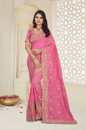 For A Rich And Elegant Look, Grab This Designer Embroidered Saree In Pink Color. This Saree And Blouse Are Silk Based Beautified With Attractive Jari Embroidery. Buy Now.