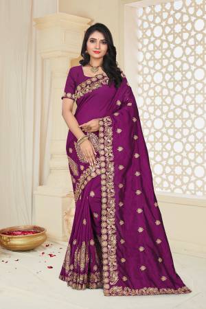 Grab This Designer Saree For The Upcoming Festive And Wedding Season In Wine Color. This Saree And Blouse Are Fabricated on Art Silk Beautified With Jari Embroidery. 