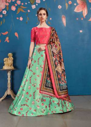 Go Colorful With This Lovely Designer Lehenga Choli In Rani Pink Colored Blouse Paired With Contrasting Sea Green Colored lehenga And Multi Colored Dupatta. Its Blouse And Lehenga Are Fabricated On Art Silk Paired With Tussar Art Silk Fabricated Dupatta. It Is Beautified With Lovely Digital Prints. Buy Now.