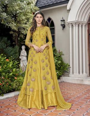 Celebrate This Festive Season With Beauty And Comfort Wearing This Designer Suit In Yellow Color. Its Pretty Embroidered Top IS Fabricated On Tissue Which Comes With An Inner Gown Fabricated On Opera House And Jacquard Silk , Paired With Chiffon Fabricated Dupatta. Buy Now.