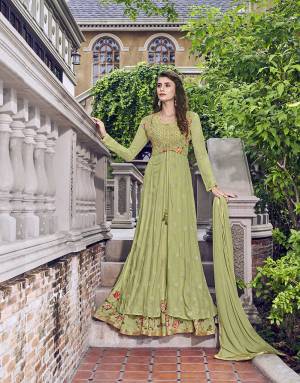 Get Ready For The Upcoming Wedding And Festive Season With This Designer Semi-Stitched Suit In Light Green Color. Its Top And Jacket Are Fabricated on Muslin Paired With Chiffon Fabricated Dupatta. It Is Beautified With Digital Prints And Detailed Embroidery. 