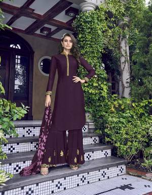 Catch All The Limelight At The Next Function You Attend Wearing This Designer Sharara Suit In All Over Wine Color. Its Top IS Silk Based paired With Georgette Bottom and Digital Printed Scarf. 