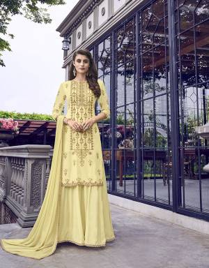 Simple And Elegant Looking Designer Suit Is Here In Light Yellow Color Which Has A Very Pretty Embroidered Top Fabricated on Muslin, Comes With An Inner Gown Also Fabricated On Muslin Paired With Chiffon Fabricated Dupatta. Buy This Lovely Piece Now.