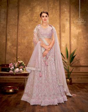 The utterly delectable and radiant pink hue fancied with magnificent ornamentation and fur details makes this lehenga a pick for youthful and modern souls. 