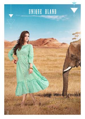 Add Some Semi-Casuals With This Readymade Kurti In Sea Green Color Fabricated on Cotton. It Is Beautified With Prints And Thread Work And Available In All Regular Sizes. 