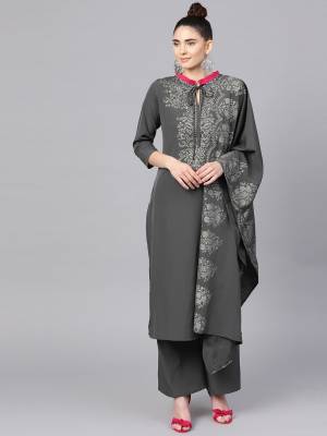 Flaunt Your Rich And Elegant Taste Wearing This Designer Readymade Suit In All Over Dark Grey Color. Its Top, Bottom And Dupatta Are Fabricated on Crepe Which Is Soft Towards Skin and Ensures Superb Comfort All Day Long. 